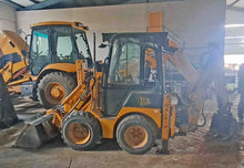 Mini retrocargadora JCB 1CX Walkia con cazos y circuito hidráulico auxiliar