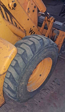 Mini retrocargadora JCB 1CX Walkia con cazos y circuito hidráulico auxiliar