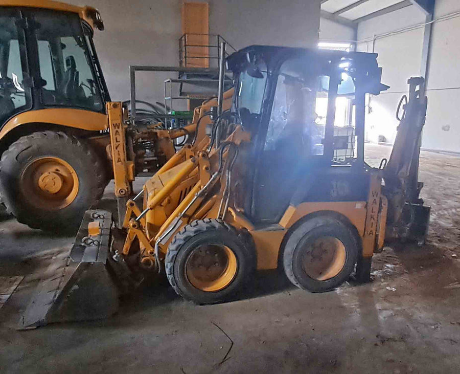 Mini retrocargadora JCB 1CX Walkia con cazos y circuito hidráulico auxiliar