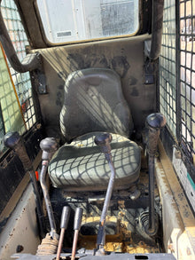 Minicargadora Bobcat 753 2003 con retroexcavadora y cucharas - imagen 2