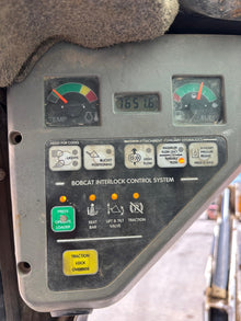 Minicargadora Bobcat 753 2003 con retroexcavadora y cucharas - imagen 5